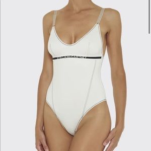 STELLA MCCARTNEY very damaged! Size large
Logo Tape One-Piece Swimsuit